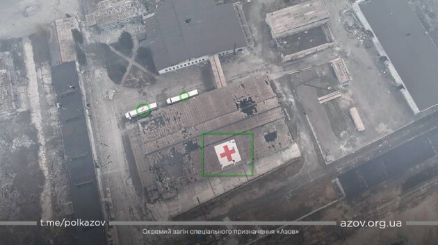 Russian troops are deliberately destroying a building with a red cross in Mariupol